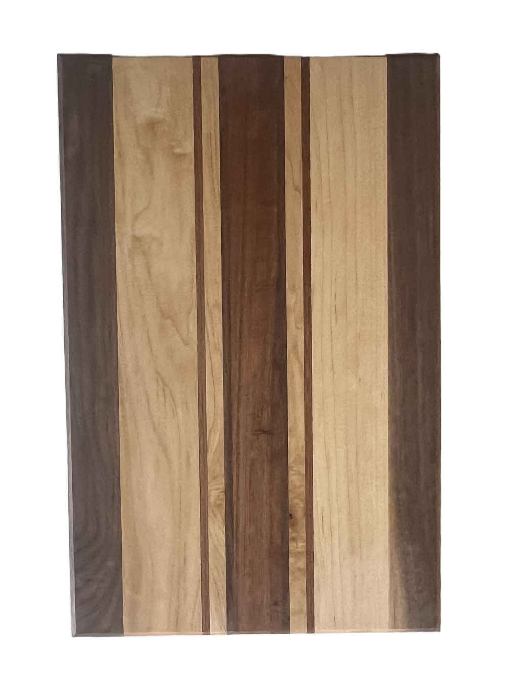 A rectangular cutting board comprised of walnut, maple, and cherry.  The size is approximately 3/4" x 12" x 18".  Custom sizes are available. 